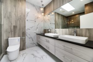 white bathroom with wood accents